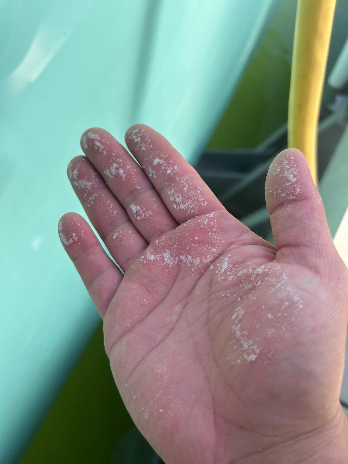 Salt oxidation damage on yacht hull before restoration, Panama City FL